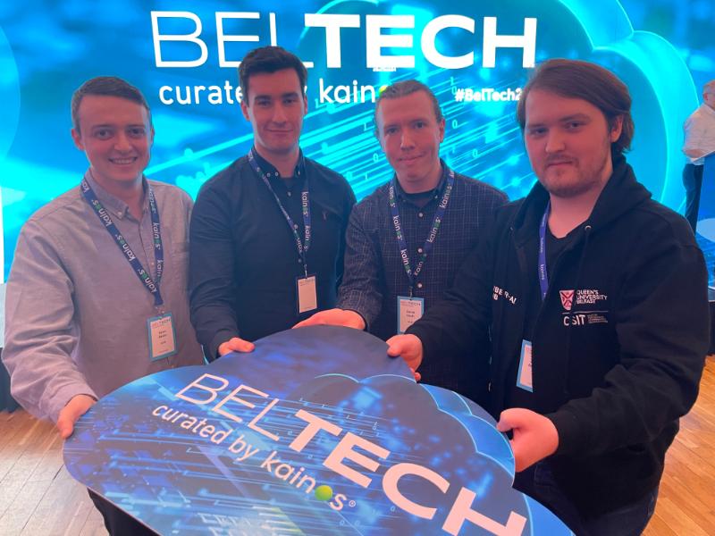 4 students holding Beltech logo